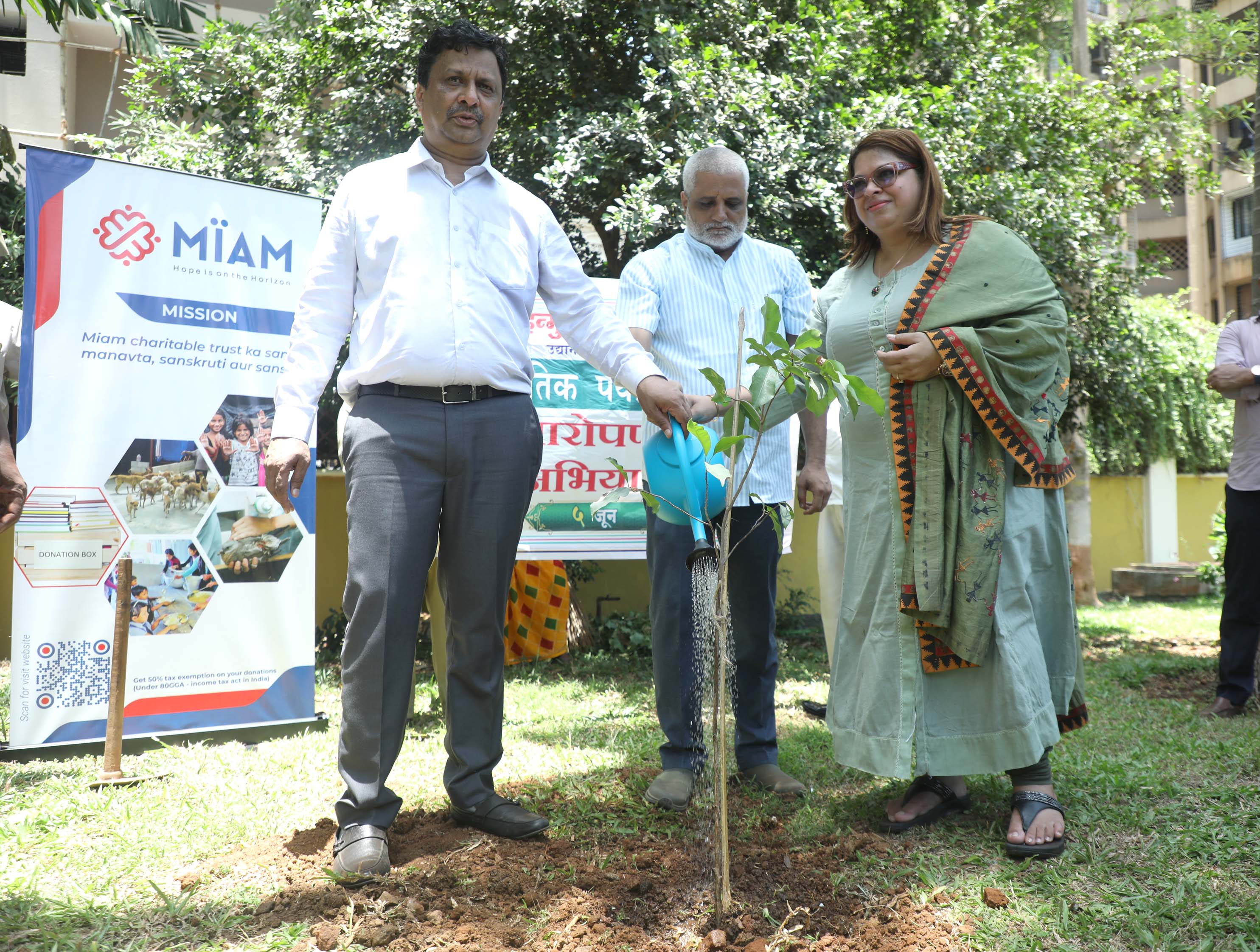 Nitu Joshi of Miam Charitable Trust and Jeetendra Pardeshi of BMC Plant Trees on World Environment Day Nitu Joshi of Miam Charitable Trust and Jeetendra Pardeshi of BMC Plant Trees on World Environment Day