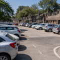 Visitors and vehicles near Rock Garden Chandigarh with improved parking area and traffic management scene
