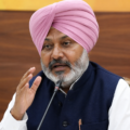 Punjab Finance Minister Harpal Singh Cheema addresses a press conference while responding to political allegations against Chief Minister Bhagwant Mann.
