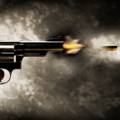Police investigate a house after unidentified motorcycle riders fired multiple shots in Batala.