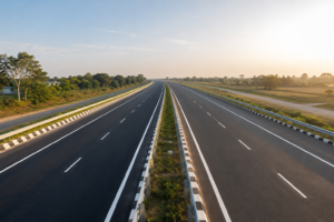 Newly constructed multi-lane highway stretching through open countryside, representing improved road connectivity and faster travel between cities.