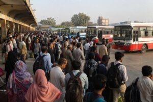 Passengers wait at crowded bus stands across Punjab amid widespread disruption of public bus services and travel delays.