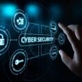 A person using a laptop protected by a digital shield, with glowing cybersecurity icons, encrypted data streams, and a secure network background representing online safety.