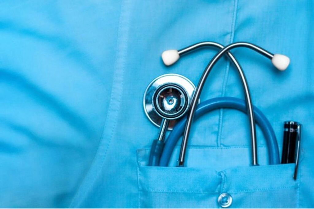 diarrhoea casews Close-up of a medical professional's uniform with a stethoscope placed in the front pocket, symbolizing healthcare services and public health initiatives.