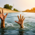 hands reaching from water