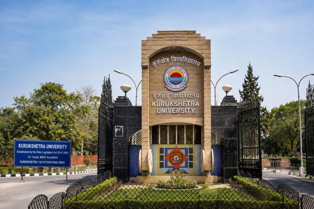 Kurukshetra University entrance gate in Haryana with its main building and landscaped campus surroundings